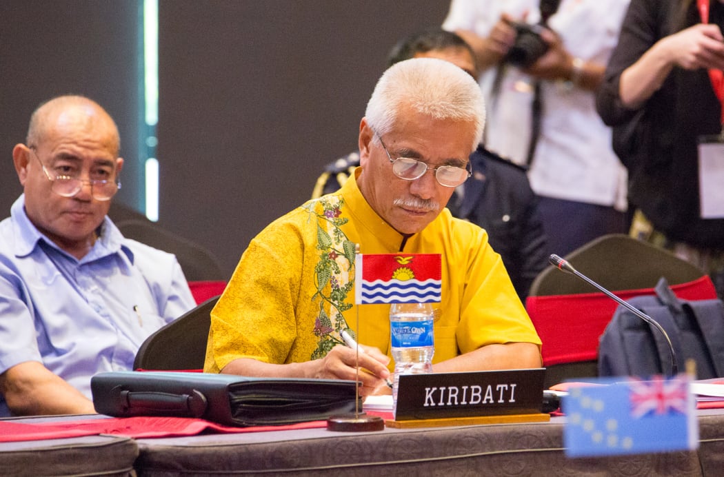 Kiribati President Anote Tong (centre) listens to a speaker during the smaller island states leaders' meeting as part of the Pacific Islands Forum in Port Moresby.