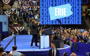 ERIE, PENNSYLVANIA - OCTOBER 14: Democratic presidential nominee, Vice President Kamala Harris speaks during a campaign rally at Erie Insurance Arena on October 14, 2024 in Erie, Pennsylvania. U.S. Sen. John Fetterman (D-PA) was scheduled to attend the evening event with Harris, who is stumping in this bellwether county of a battleground state in which a recent New York Times/Siena College poll shows her leading, but within the margin of error.   Michael M. Santiago/Getty Images/AFP (Photo by Michael M. Santiago / GETTY IMAGES NORTH AMERICA / Getty Images via AFP)