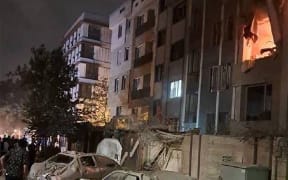 This handout photo released by Iran's Revolutionary Guard Corps (IRGC) official Sepah News Telegram channel on June 13, 2025 reportedly shows a building in Tehran hit in an Israeli strike on the Iranian capital early in the morning. Israeli Prime Minister Benjamin Netanyahu said in a video statement in the early hours of June 13 that Israel carried out strikes on Iran and the military operation against the Islamic republic would  "continue for as many days as it takes". (Photo by SEPAH NEWS / AFP) / RESTRICTED TO EDITORIAL USE - MANDATORY CREDIT "AFP PHOTO / SEPAH NEWS  " - NO MARKETING NO ADVERTISING CAMPAIGNS - DISTRIBUTED AS A SERVICE TO CLIENTS