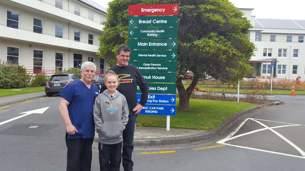 Nicole Thornton with her doctor Richard Stein and father Kerry Thornton.
