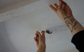 Rose says at the touch of her finger the ceiling in the kitchen gives in.