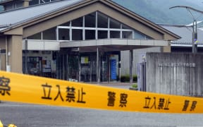 Police tape cordens off the Tsukui Yamayuri Garden facility in Sagamihara, Japan, where the knife attack too place.