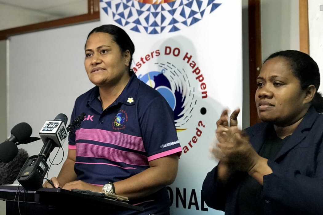 Fiji's national disaster management office director Vasiti Soko (left) speaks at a press conference ahead of the arrival of super Cyclone Yasa in Fiji's capital city of Suva on December 16, 2020.
