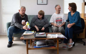 Peter Humphreys (left) with his daughter Sian, and Christine Fleming (right) with her son Justin Coote. Photo / Sylvie Whinray