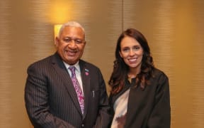 Fiji PM Frank Bainimarama with New Zealand's Jacinda Ardern in London