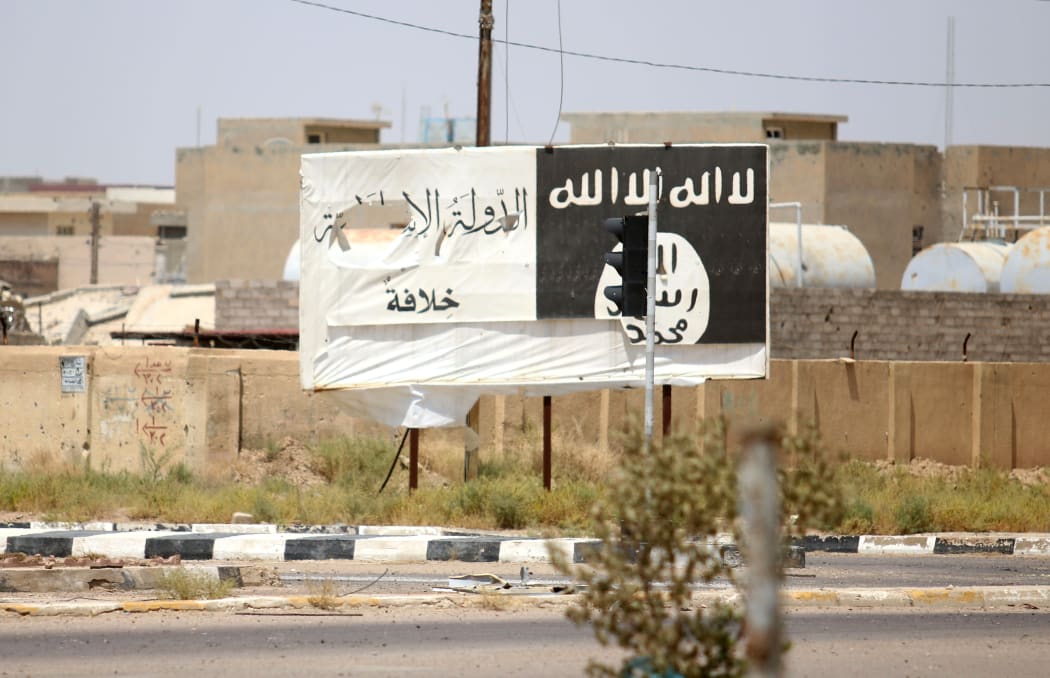 A billboard of the Islamic State group in Fallujah which is 50km from Baghdad, and was retaken by Iraqi forces on 26 June.
