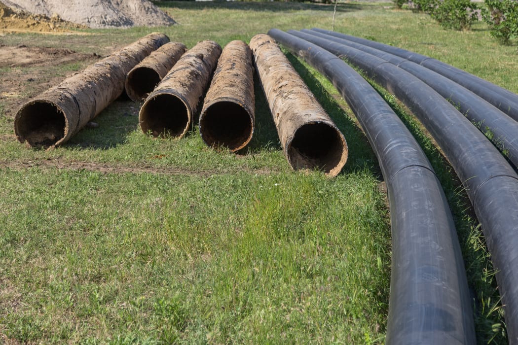 Replacement of old rusted broken metal water pipes with modern plastic pipes