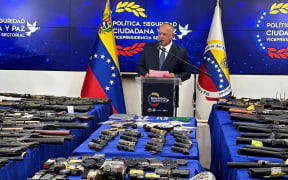 Venezuela’s Interior Minister Diosdado Cabello announces foreigners are being held on suspicion of trying to destabilise the country, and displays weapons seized by authorities, in Caracas on 14 September, 2024.