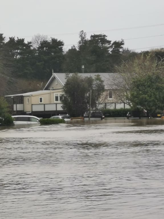 Street in Auckland's Huapai that flooded during severe weather, meaning a number of residents were accepted for council buy-out.
