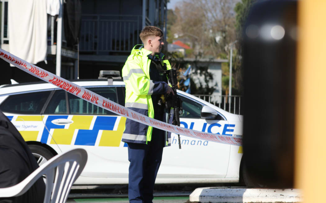 Police cordon off Tuarangi Road in Auckland's Grey Lynn after a man was killed and three wounded in a shooting on September 5, 2024.