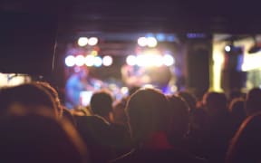 Audience watching live music.