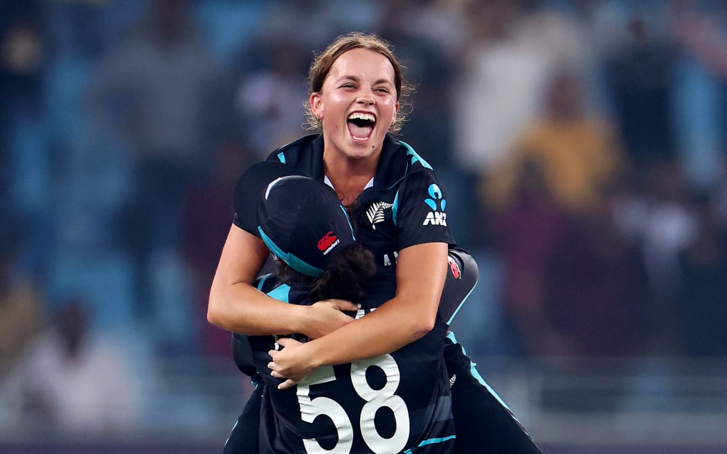 Eden Carson of New Zealand celebrates with teammate Georgia Plimmer after defeating South Africa during the ICC Women's T20 World Cup Final 2024.