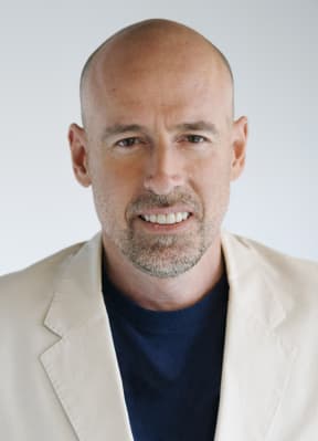 Scott Galloway, chief investment officer and founder of Firebrand Partners, stands for a portrait before an interview in New York, U.S., on Friday, Aug. 13, 2010. Galloway is also a professor at New York University's Stern School of Business.