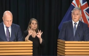 The PM and his corrections minister at a media conference requiring significant corrections.