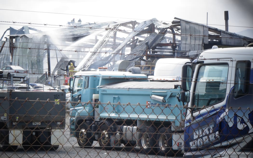 Firefighters at the scene of a blaze at an industrial site in Wiri, Auckland.