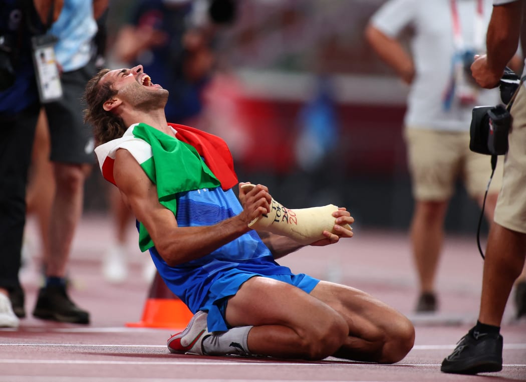 Gianmarco Tamberi wins a gold in the high jump.