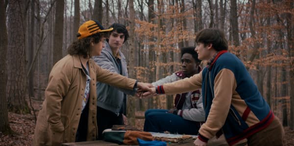 STRANGER THINGS: SEASON 5. (L to R) Gaten Matarazzo as Dustin Henderson, Finn Wolfhard as Mike Wheeler, Caleb McLaughlin as Lucas Sinclair, and Noah Schnapp as Will Byers in STRANGER THINGS: SEASON 5. Cr. Courtesy of Netflix © 2025