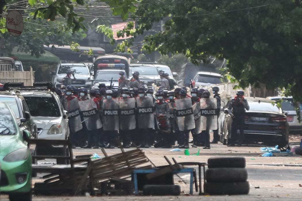 Protesters continue to protest against military coup and detention of elected government members in Yangon, Myanmar on March 13, 2021.