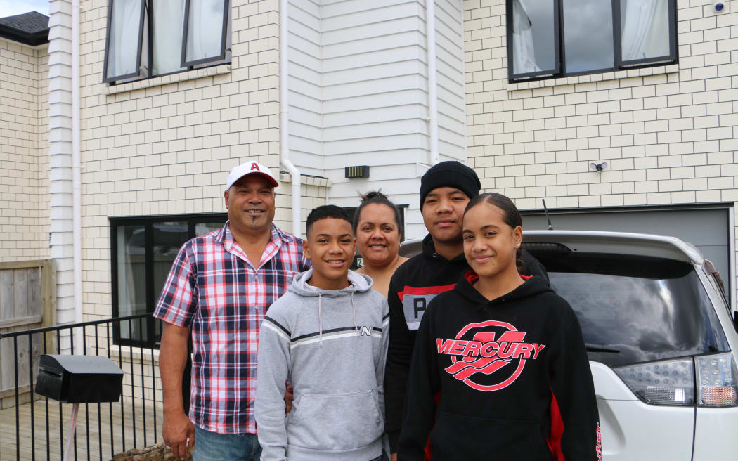 Sateki Vehikite (left), his wife Mele Vehikite (centre) and their children.