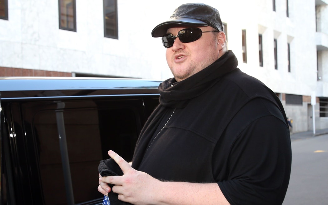 Kim Dotcom outside the Auckland courthouse.
