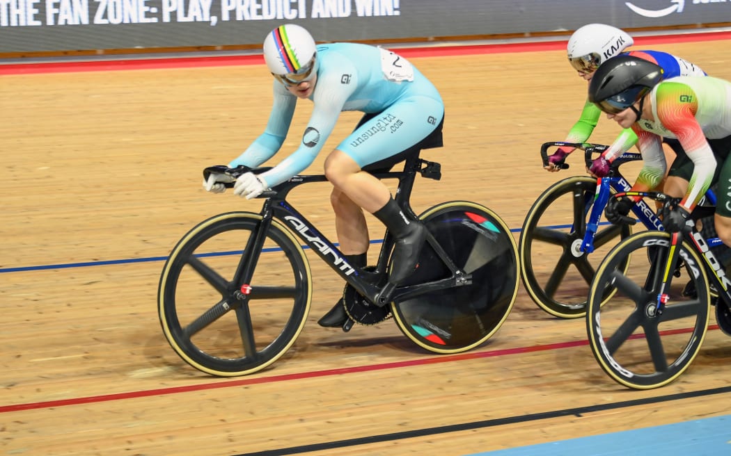 Ellesse Andrews leads a women's Keirin race at the UCI Track Champions League meet in London.