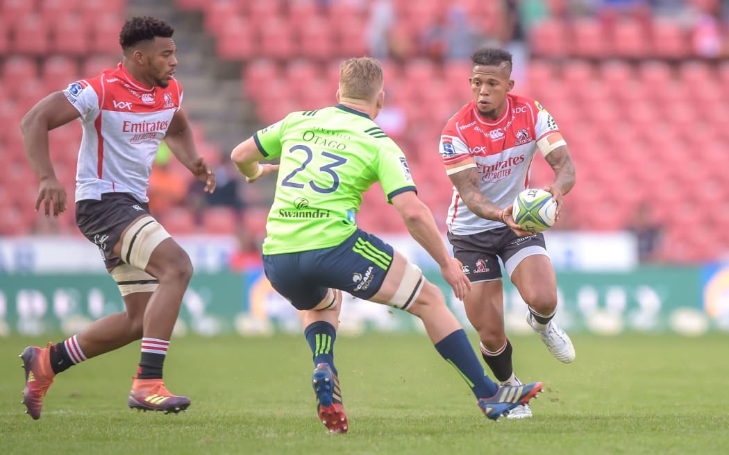 The Highlanders' Waisake Naholo and The Emirates Lions' Elton Jantjies during the 2019 Super Rugby match between the Emirates Lions and the Highlanders at the Ellis Park Stadium, Johannesburg on the 18 May 2019 
Â©Christiaan Kotze/BackpagePix