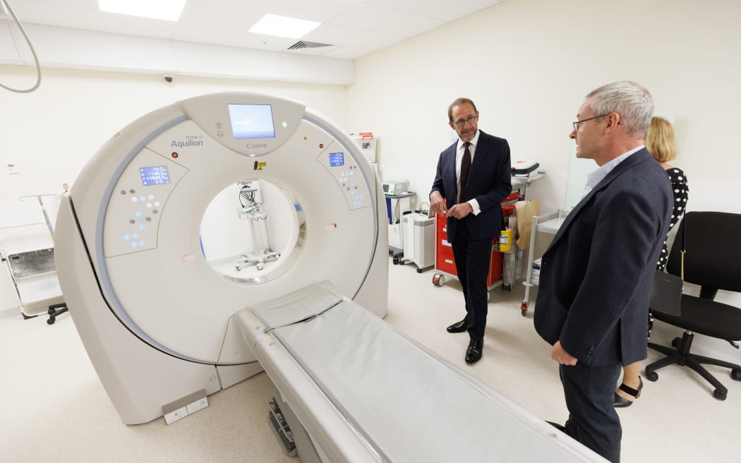Taupō Hospital leaders show Health Minister Andrew Little around a new CT scanner.