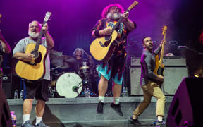 CHARLOTTE, NORTH CAROLINA - SEPTEMBER 06: (L-R) Kyle Gass, Jack Black  and bassist John Spiker of Tenacious D perform at PNC Music Pavilion on September 06, 2023 in Charlotte, North Carolina. (Photo by Jeff Hahne/Getty Images)