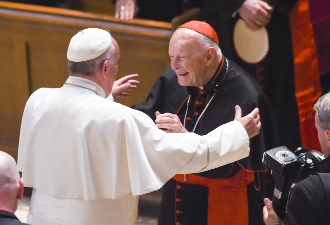 Pope Francis reaches out to hug Cardinal Theodore McCarrick at the Cathedral of St. Matthew the Apostle on 23 September, 2015 in Washington, DC.