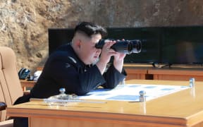 Kim Jong-Un inspecting the test-fire of intercontinental ballistic missile Hwasong-14 at an undisclosed location.