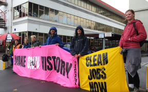 Protesters outside the OMV offices in New Plymouth on Monday 2/12/19.