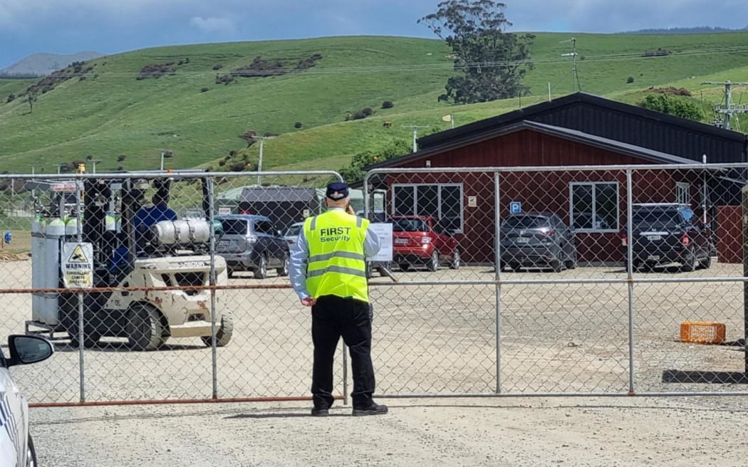 Gas bottles are being moved from the entrance to further onto Hillgrove Egg Farm on 3 December 2024.