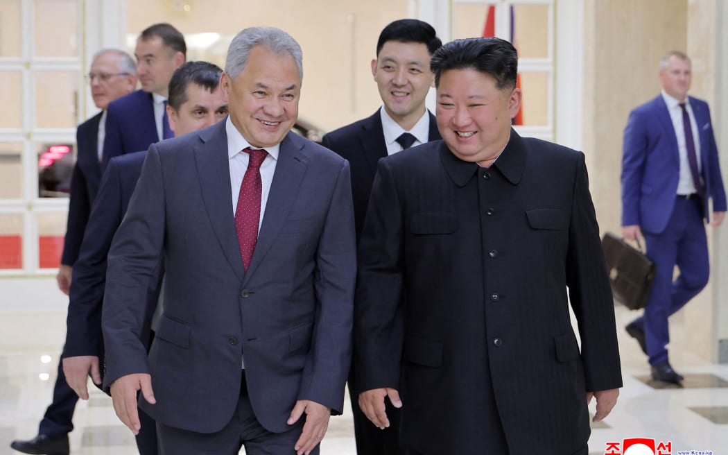 This picture taken on June 17, 2025 and released from North Korea's official Korean Central News Agency (KCNA) via KNS on June 18, 2025 shows North Korea's leader Kim Jong Un (R) meeting with Russian Security Council Secretary Sergei Shoigu (L) at the headquarters of the Central Committee of the Workers' Party of Korea in Pyongyang. Shoigu arrived on June 17 in North Korea to meet Kim for a second time in less than two weeks, Russian news agencies reported. (Photo by KCNA VIA KNS / AFP) / South Korea OUT / SOUTH KOREA OUT / SOUTH KOREA OUT / REPUBLIC OF KOREA OUT
---EDITORS NOTE--- RESTRICTED TO EDITORIAL USE - MANDATORY CREDIT "AFP PHOTO/KCNA VIA KNS" - NO MARKETING NO ADVERTISING CAMPAIGNS - DISTRIBUTED AS A SERVICE TO CLIENTS / THIS PICTURE WAS MADE AVAILABLE BY A THIRD PARTY. AFP CAN NOT INDEPENDENTLY VERIFY THE AUTHENTICITY, LOCATION, DATE AND CONTENT OF THIS IMAGE --- /