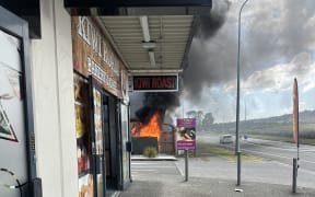Fire and Emergency responded to a blaze at a group of shops at the intersection of Chapel and Ormiston roads, in Auckland's Flat Bush, on 13 February, 2024.
