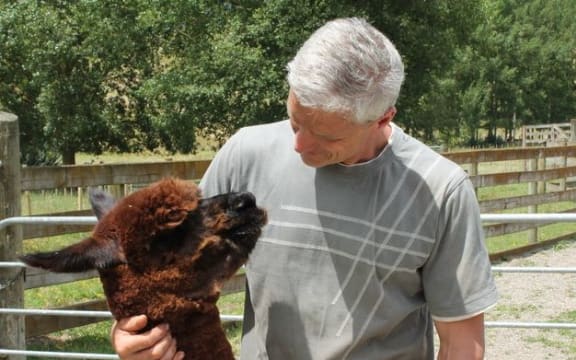 Keenan Scott with an alpaca