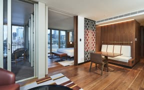 The new Park Hyatt Hotel has 195 rooms which have been designed to reflect a Māori wharenui (house).