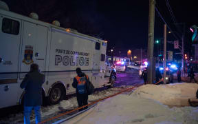Police officers respond to a shooting in a mosque at the Québec City Islamic cultural center on Sainte-Foy Street in Quebec city.