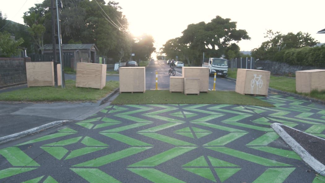 A young cyclist approaches the Arthur St low traffic area roadblocks.