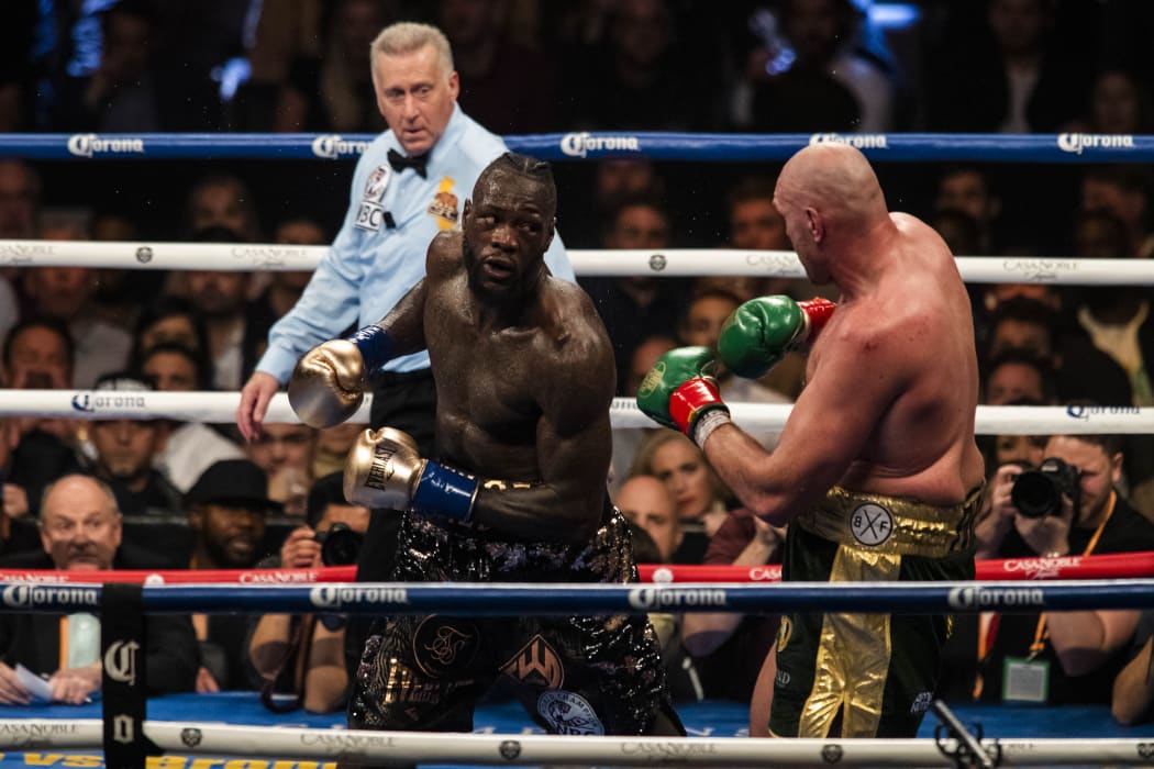 Tyson Fury in action against Deontay Wilder during the 12th round of the WBC Heavyweight Championship at the Staples Center in Los Angeles, California.
