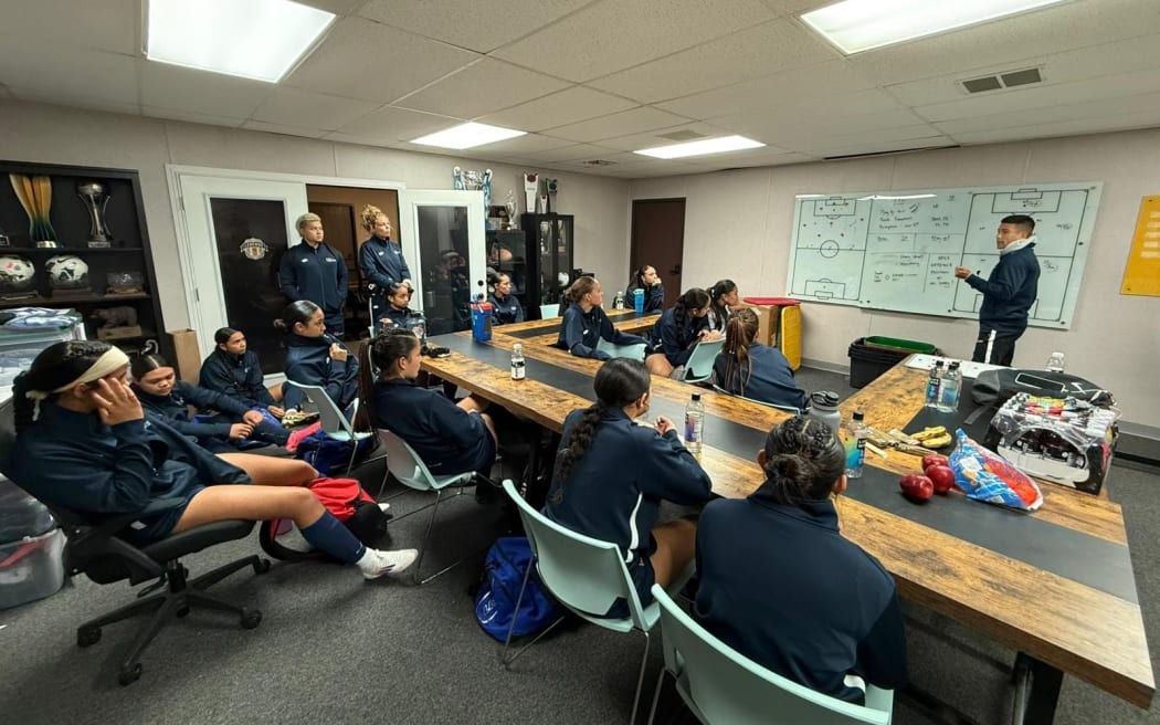 Coach Juan Chang Urrea in a tactical meeting with the Samoa Under-17 women’s team during their training camp in California.