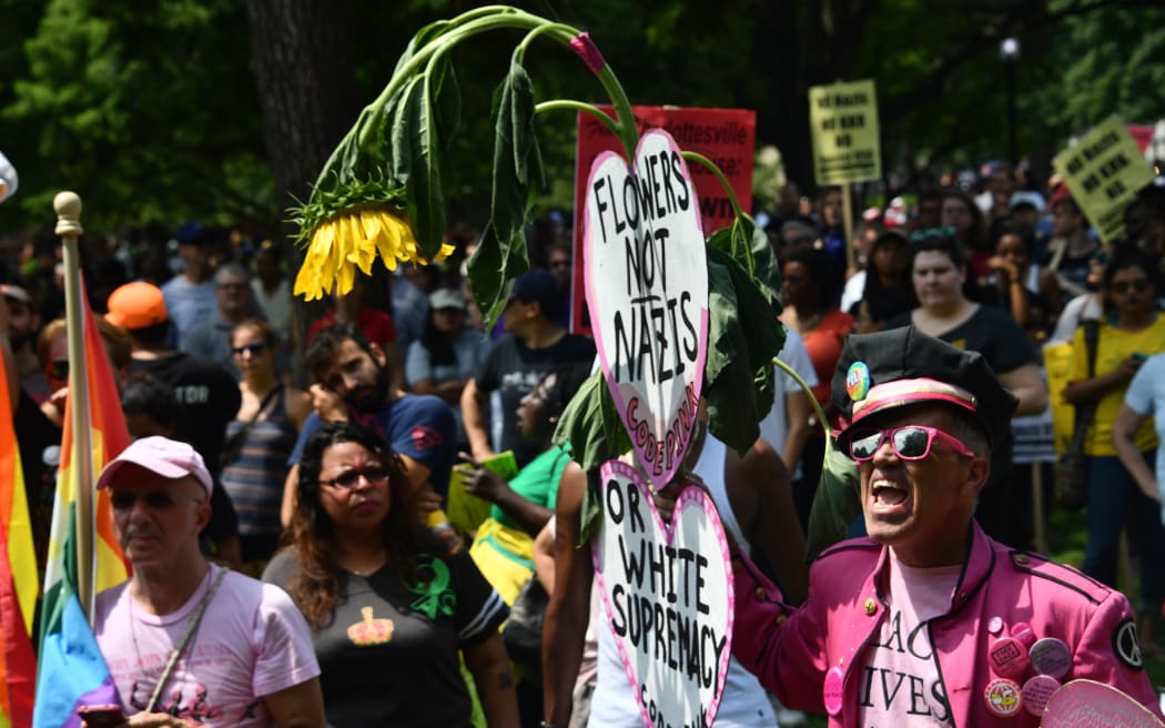 Demonstrators opposed to a far-right rally gather at Lafayette Park opposite the White House.