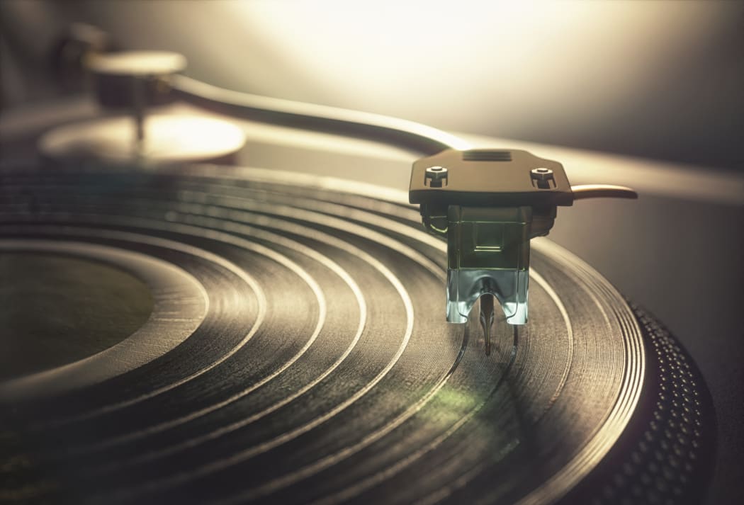 Record player needle on record, illustration. (Photo by KTSDESIGN/SCIENCE PHOTO LIBRARY / KTS / Science Photo Library via AFP)