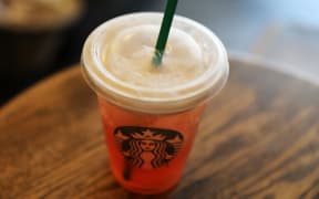 Starbucks will phase out single-use straws from its more than 28,000 locations, cutting out an estimated 1bn straws each year.