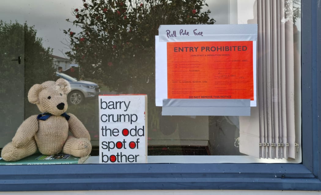 The red-stickered home of George and Dorothy Burrows in Westport