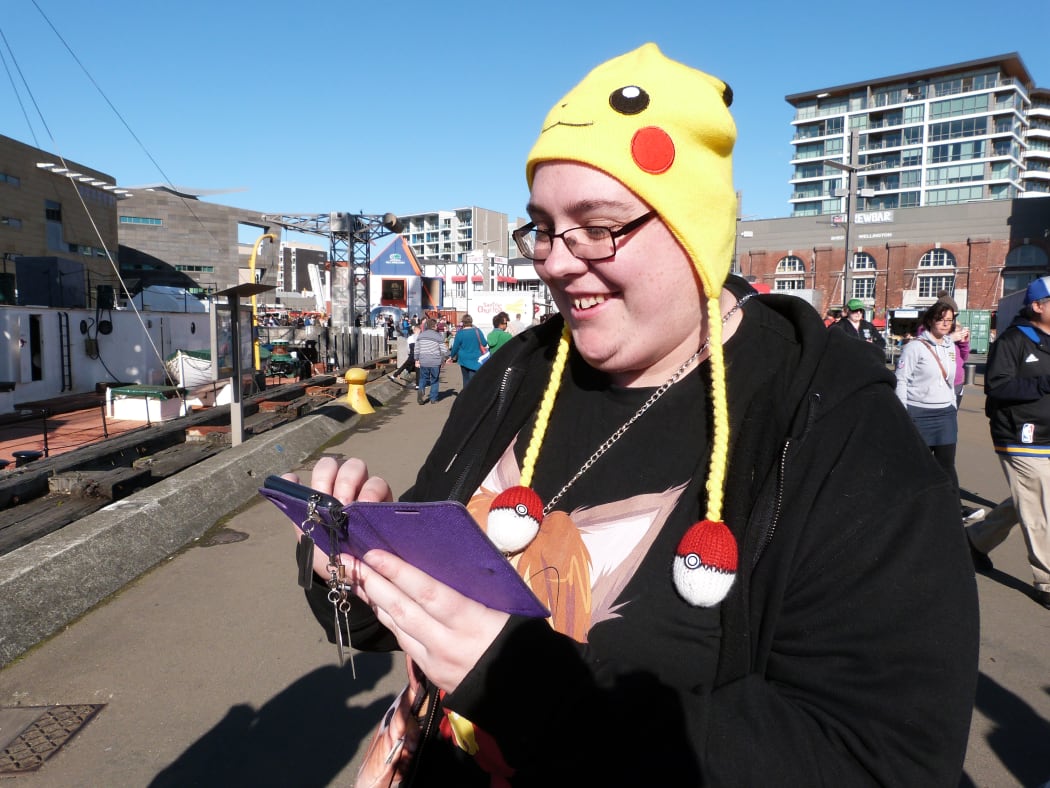 Long-time Pokemon fan Sarah Milton joins in the search for Pokemon on Wellington’s waterfront.