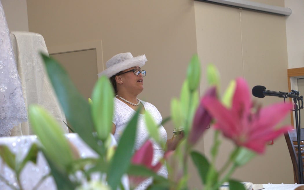 Apii Letoa reads verses from the Bible - Christmas Day service, Cook Islands Christian Church, Porirua