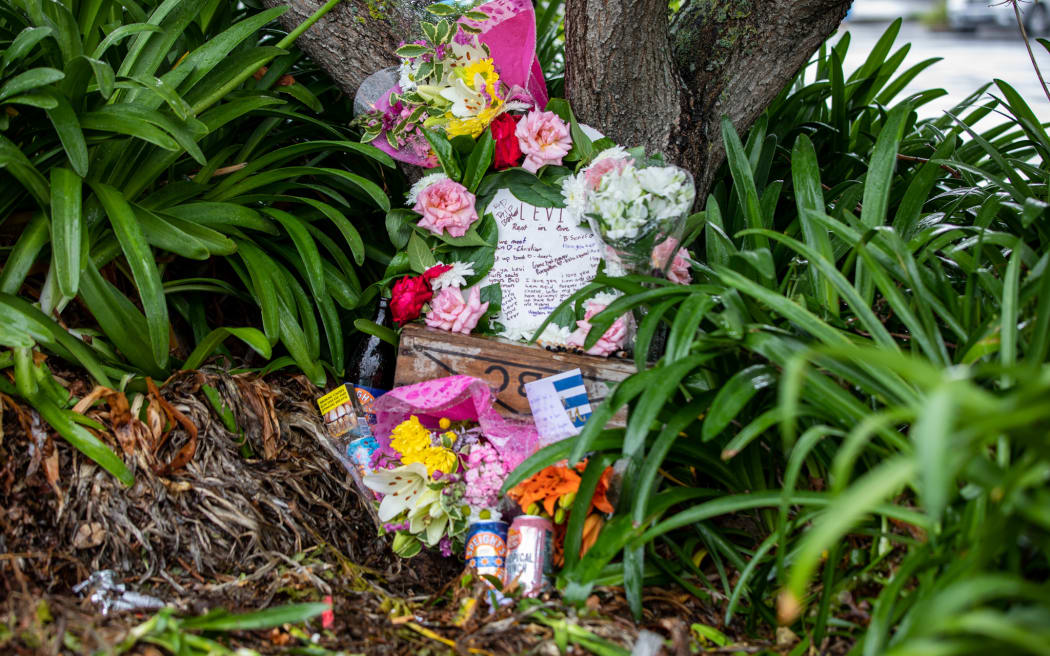 Flowers left for Levi in Countdown carpark in Christchurch