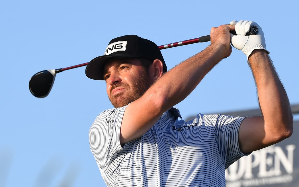 South Africa's Louis Oosthuizen tees off on the 18th during his third round of The 149th British Open Golf Championship at Royal St George's, Sandwich in south-east England on July 17, 2021.