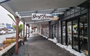Many shops on Westport's main street are closed due to the adverse weather, 4 February 2022.