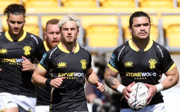 Lions captain Du'Plessis Kirifi leads his team to the field during the NPC rugby match between the Wellington Lions and Hawkes Bay at Sky Stadium in Wellington. 26 September 2021. Â© Copyright image by Marty Melville / www.photosport.nz